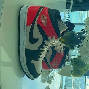 These are Jordan’s they are red black and and a little cream